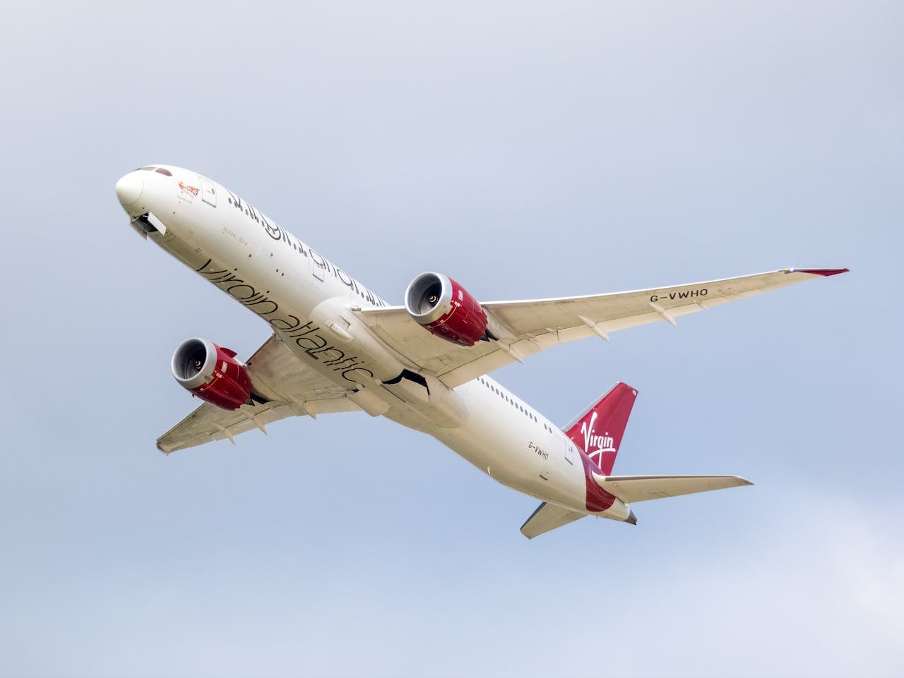 Virgin Atlantic Boeing 787 Dreamliner soaring through the sky, showcasing aviation technology.